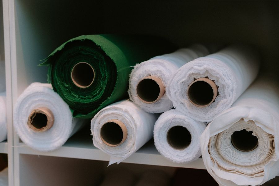 Rolls of PVC coated fabric stored on shelving